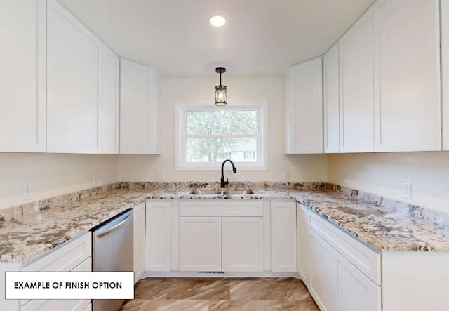 kitchen featuring dishwasher, pendant lighting, sink, light stone countertops, and white cabinets