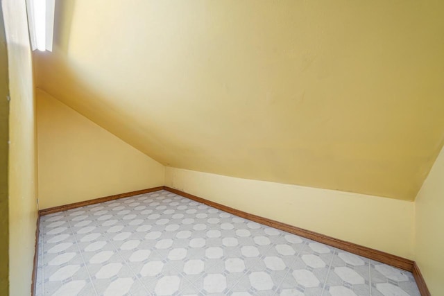 bonus room featuring vaulted ceiling