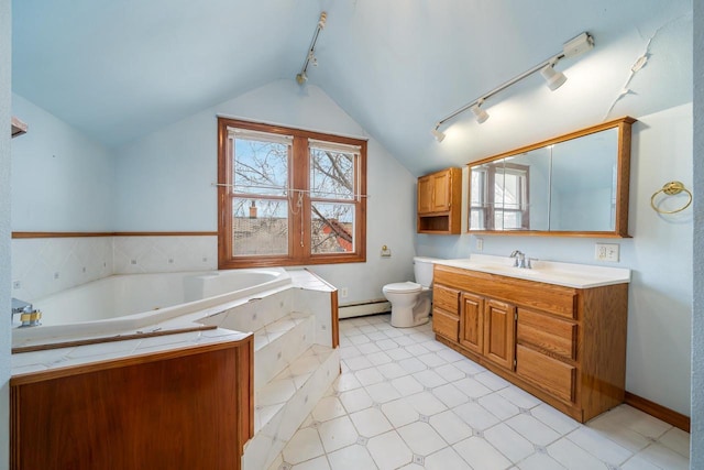 bathroom featuring lofted ceiling, vanity, toilet, tiled tub, and a baseboard radiator