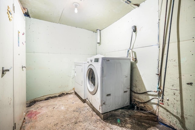 laundry area with separate washer and dryer