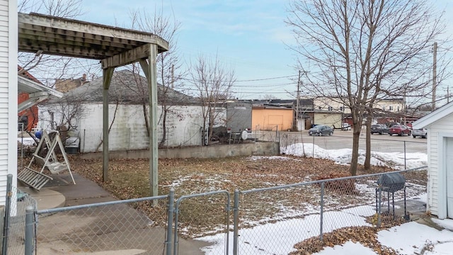 view of yard covered in snow