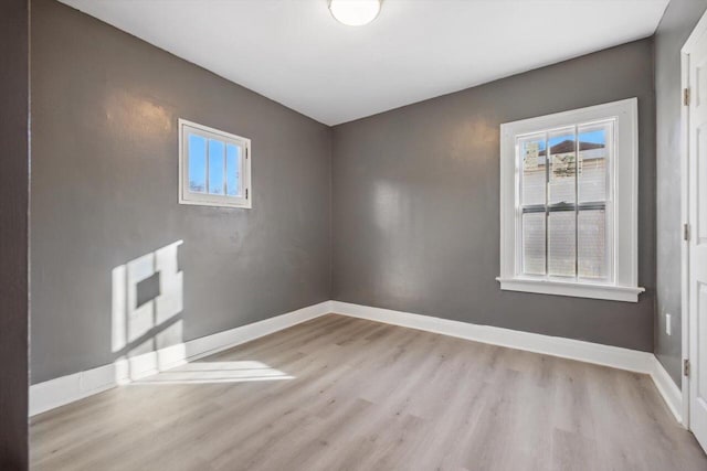 unfurnished room featuring light wood-type flooring