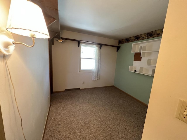 spare room featuring carpet