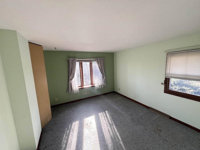 spare room with carpet flooring
