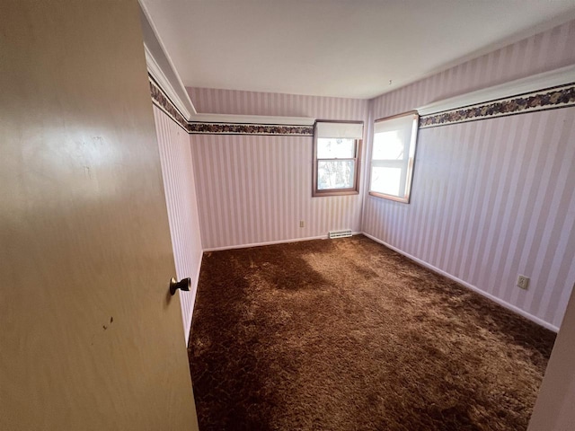 empty room with carpet flooring