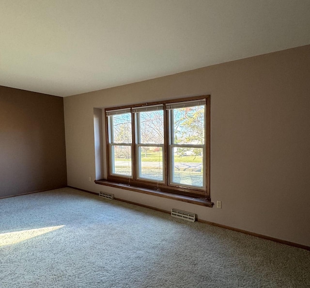 empty room featuring carpet