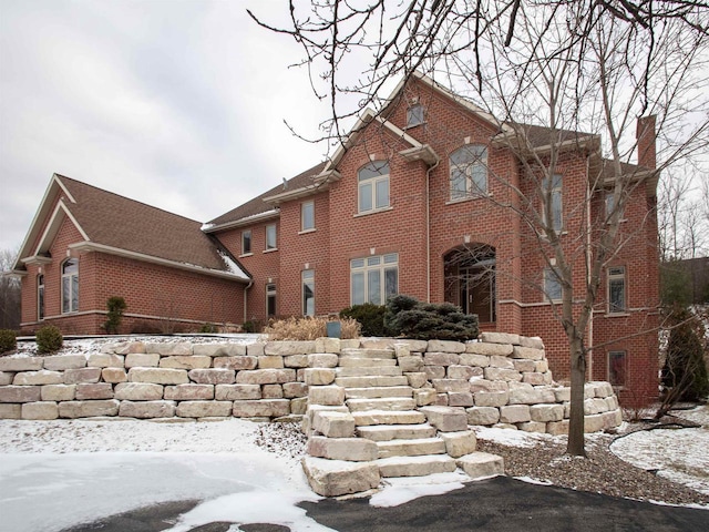 view of snow covered property