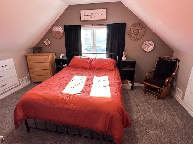 bedroom featuring carpet and vaulted ceiling