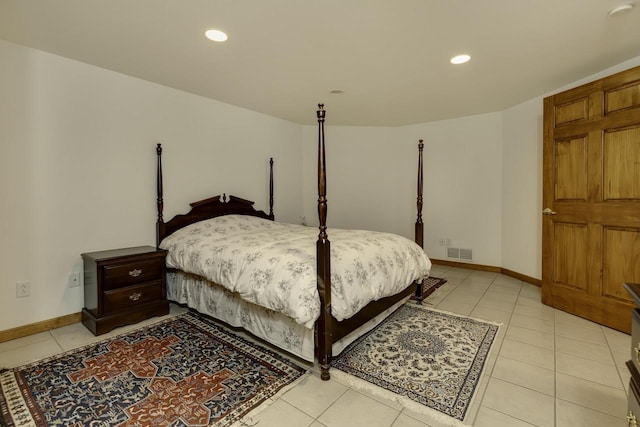 bedroom with light tile patterned floors, recessed lighting, visible vents, and baseboards