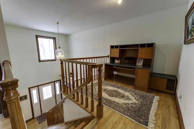 stairs with wood finished floors