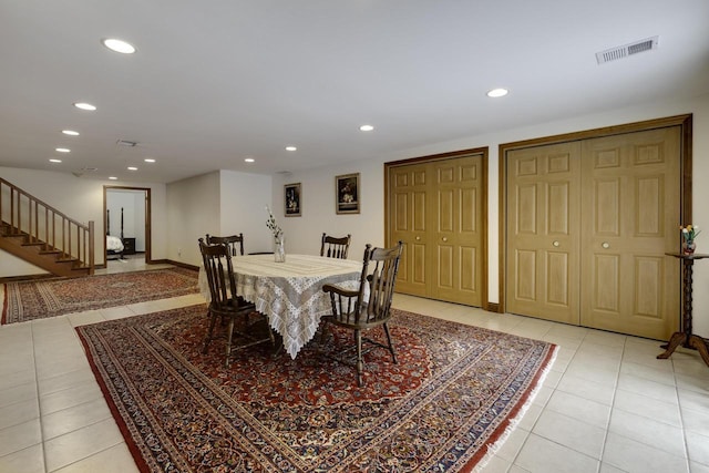 dining room featuring visible vents, baseboards, stairs, light tile patterned floors, and recessed lighting