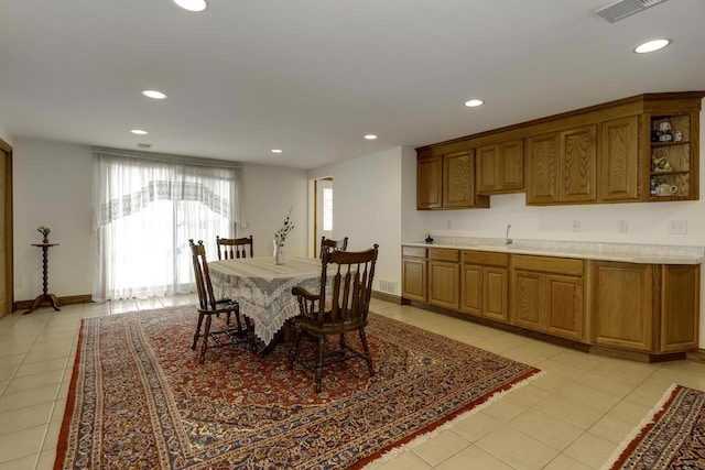 dining area featuring light tile patterned floors, visible vents, baseboards, and recessed lighting