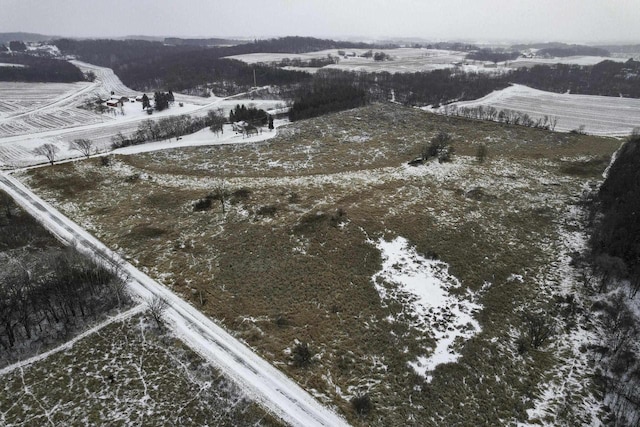 birds eye view of property featuring a rural view