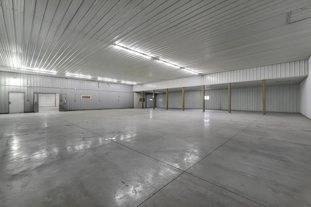 garage featuring metal wall