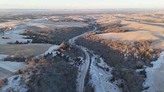 birds eye view of property featuring a rural view