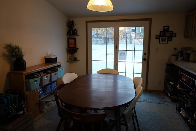 dining area with carpet