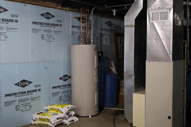 utility room with water heater