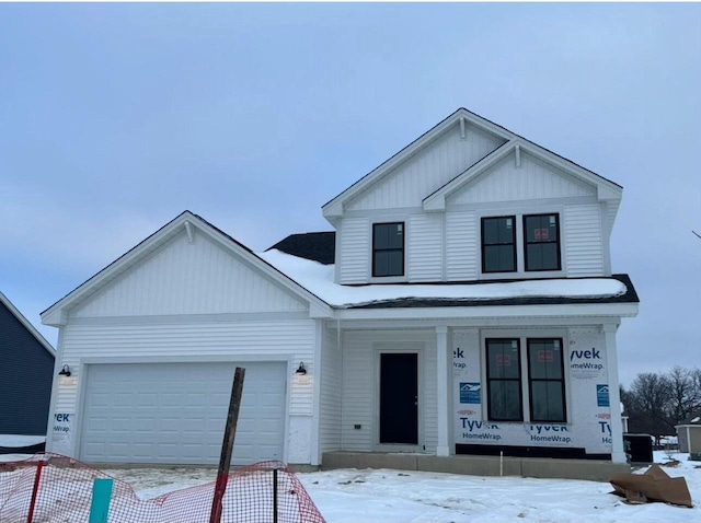 view of front of property with a garage