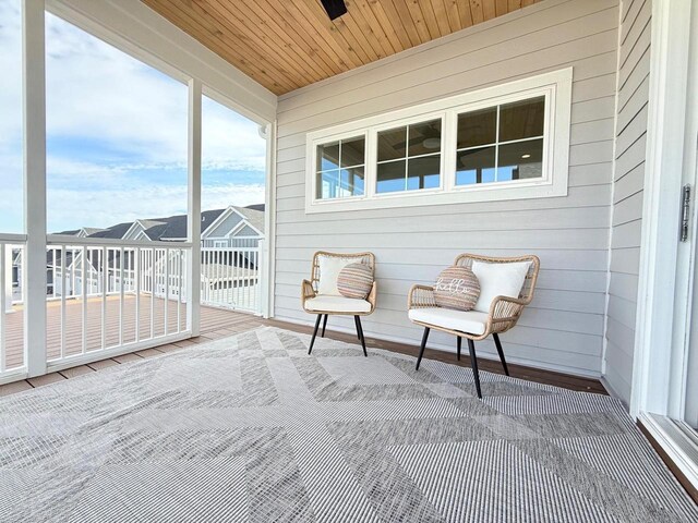 sunroom / solarium with wooden ceiling