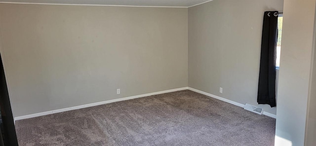 view of carpeted spare room