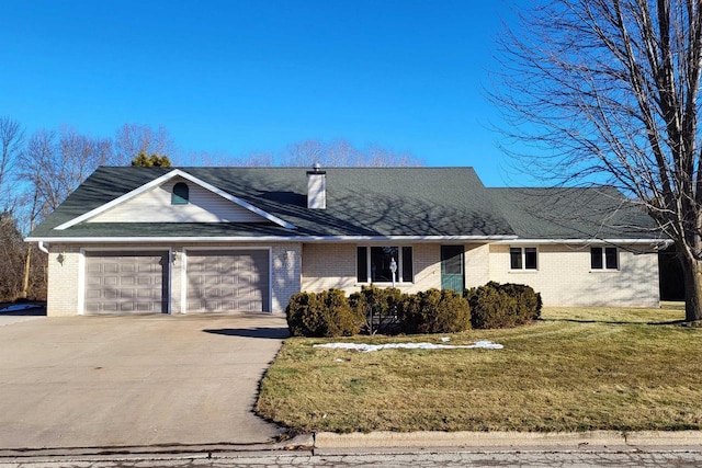 ranch-style home featuring a garage and a front lawn