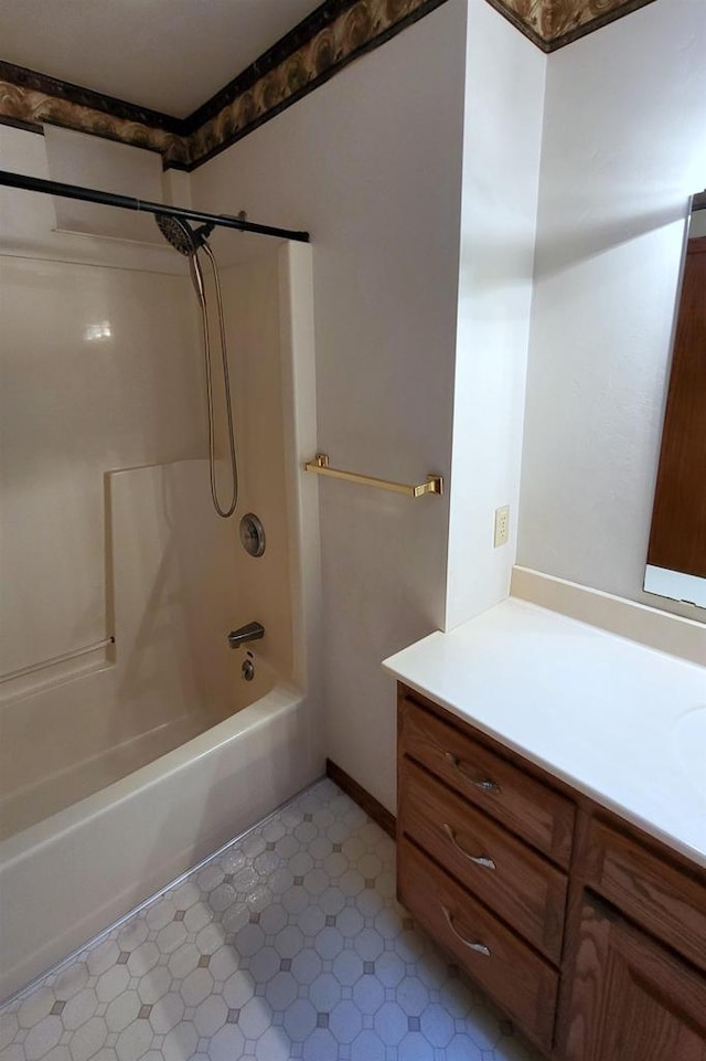 bathroom with vanity and  shower combination