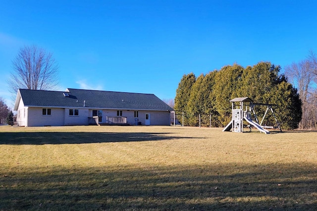 view of yard with a playground