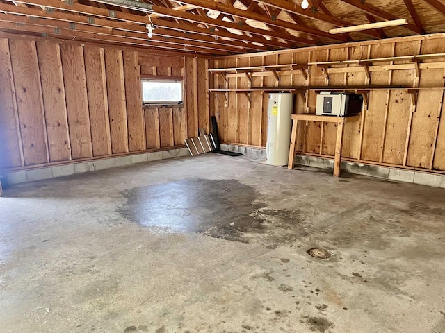 basement featuring water heater