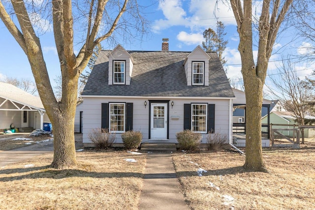 view of new england style home