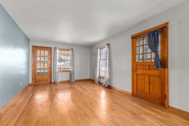 unfurnished room featuring light hardwood / wood-style flooring