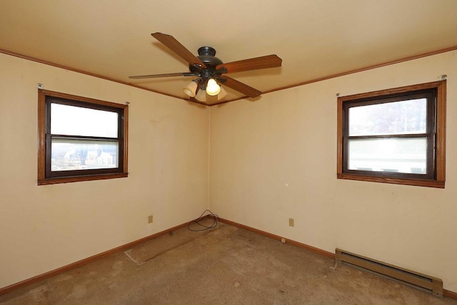 carpeted empty room with ceiling fan and a baseboard radiator