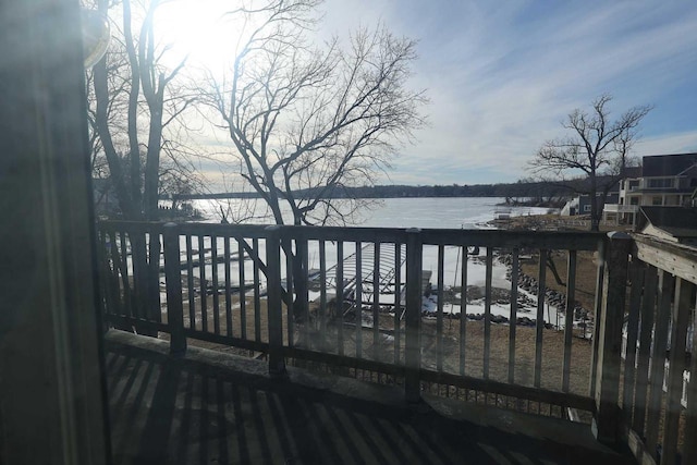 deck featuring a water view