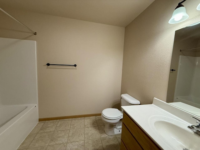 bathroom with toilet and vanity