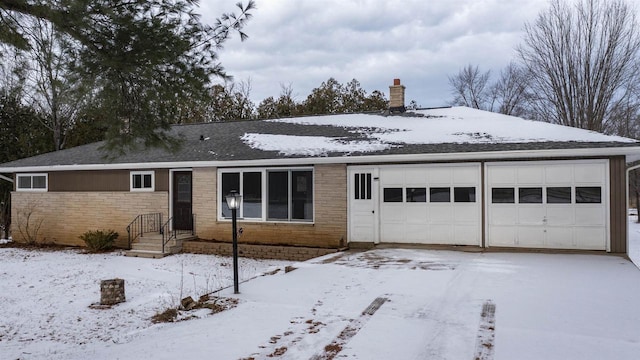 single story home featuring a garage