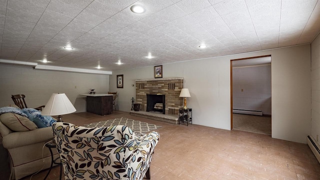 living room featuring a fireplace and a baseboard radiator