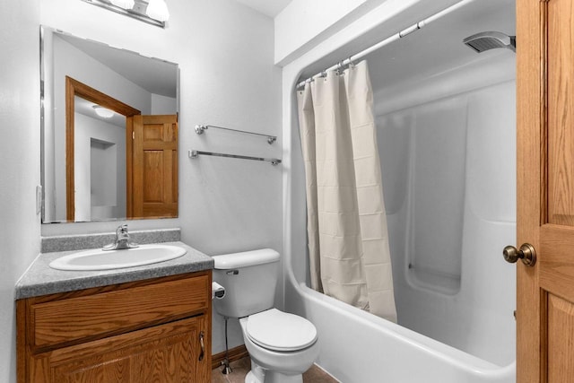 full bathroom featuring toilet, vanity, and shower / bath combination with curtain