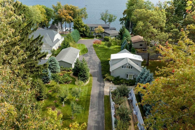 birds eye view of property featuring a water view