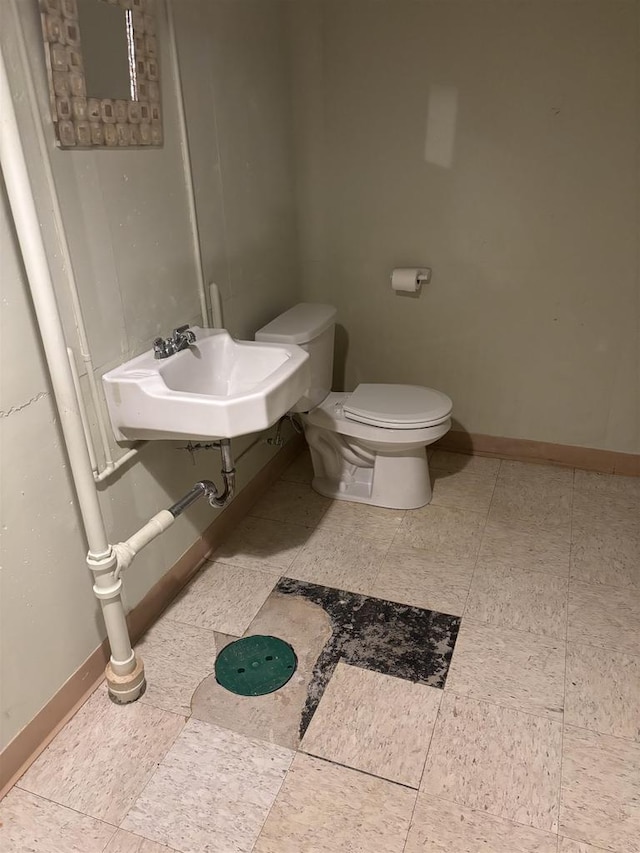 bathroom with sink and toilet