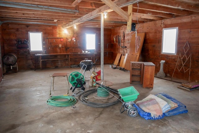 interior space with plenty of natural light and a workshop area