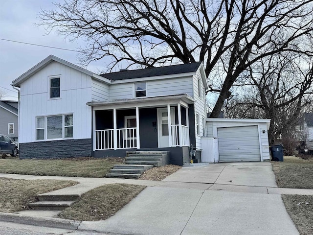 view of front of home featuring covered porch and a garage