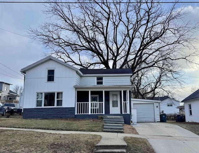 view of front of home with covered porch and a garage