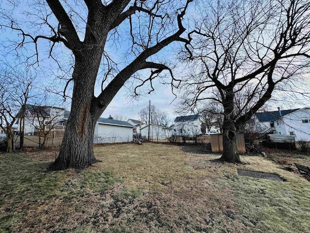 view of yard with a storage shed