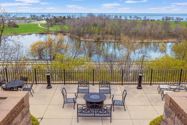 view of patio / terrace with a water view