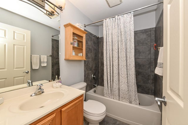 full bathroom with toilet, tile patterned flooring, shower / bath combination with curtain, and vanity