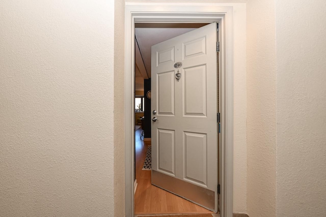 hallway featuring light hardwood / wood-style floors