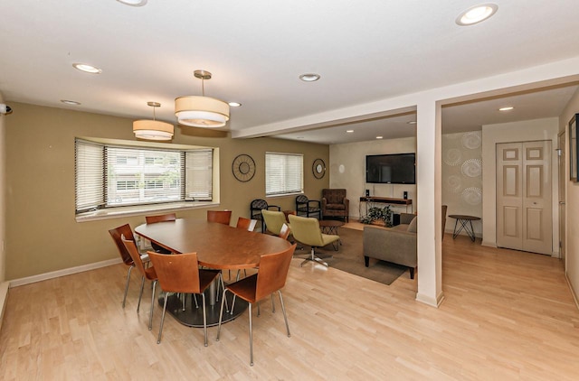 dining room with light wood-type flooring