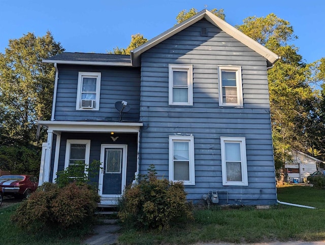 view of front of house with cooling unit