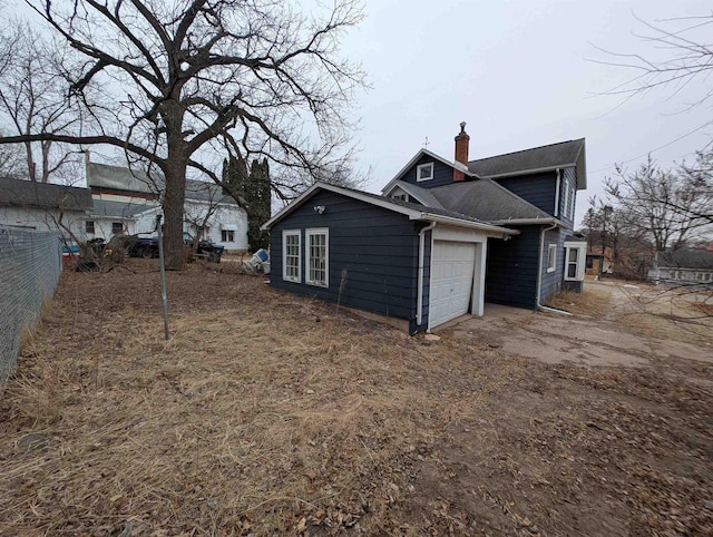 view of home's exterior with a garage