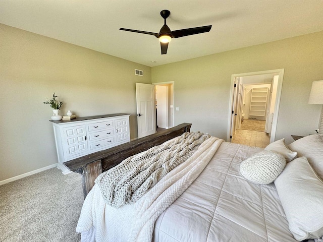 bedroom featuring ceiling fan and carpet flooring