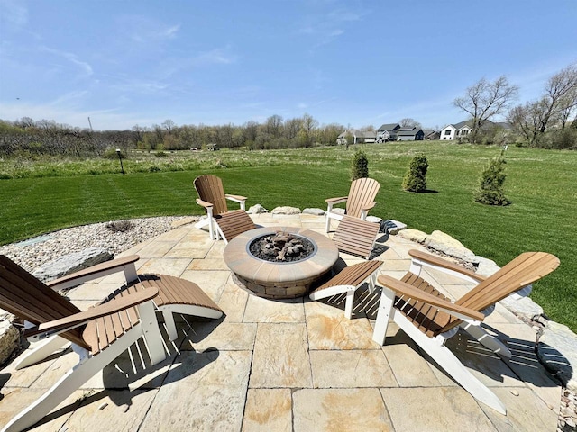 view of patio / terrace featuring a fire pit